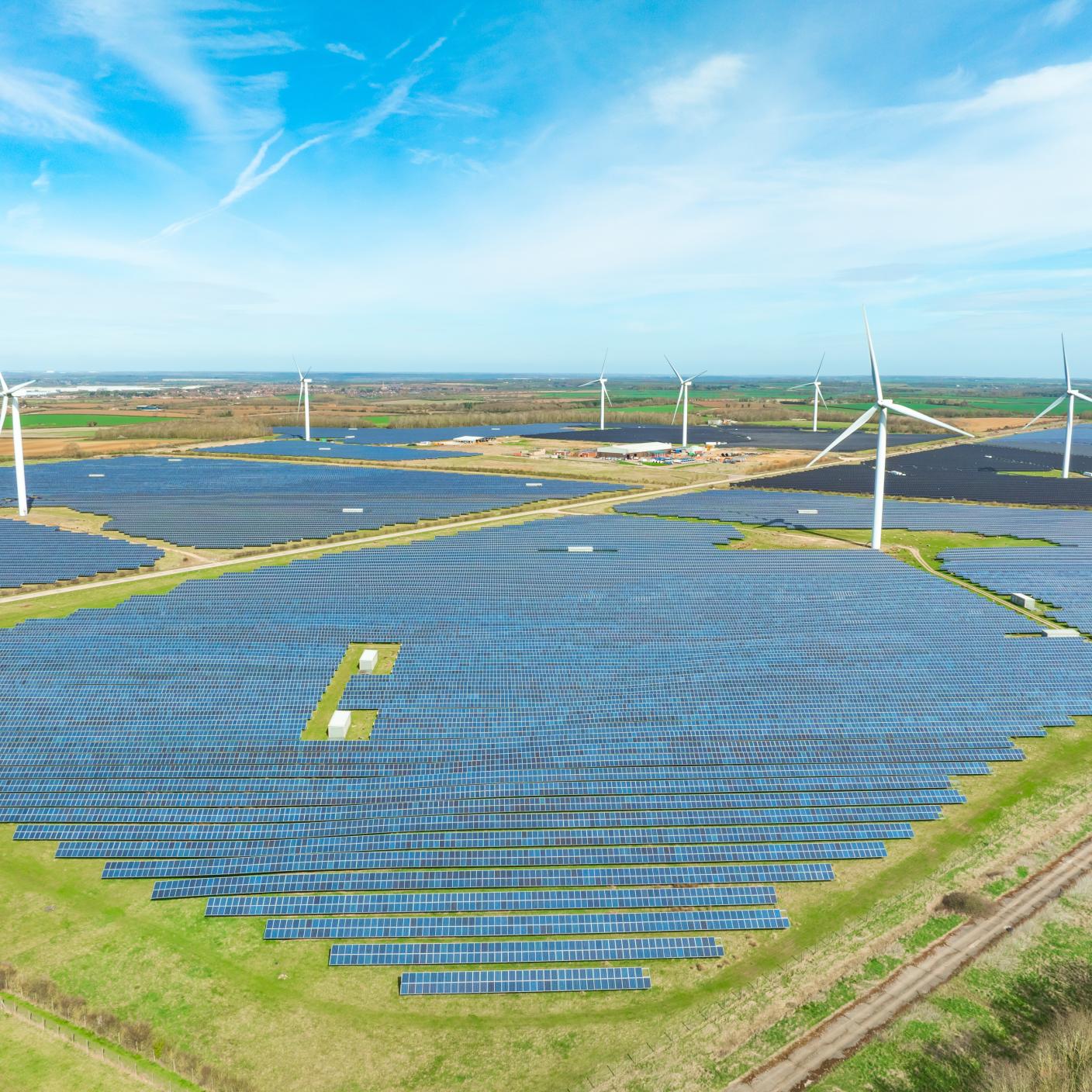 Wind turbines and solar panels in England.