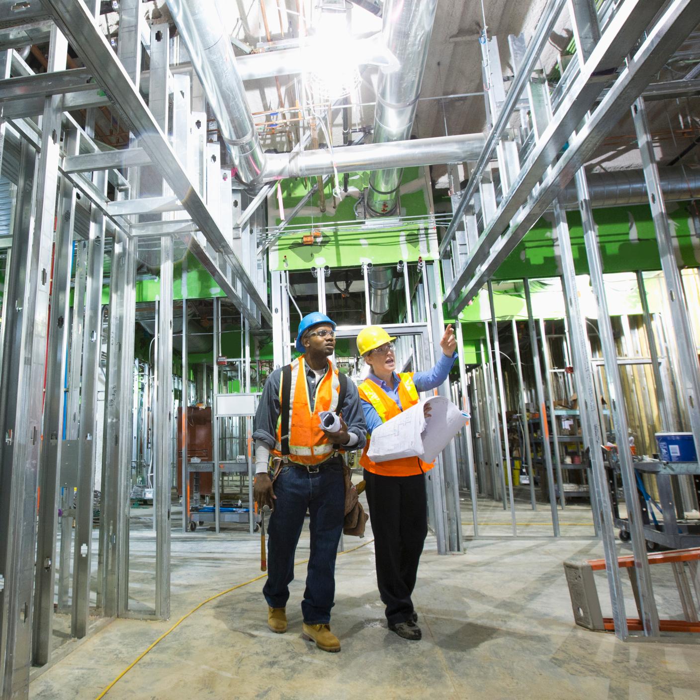Workers talking on site