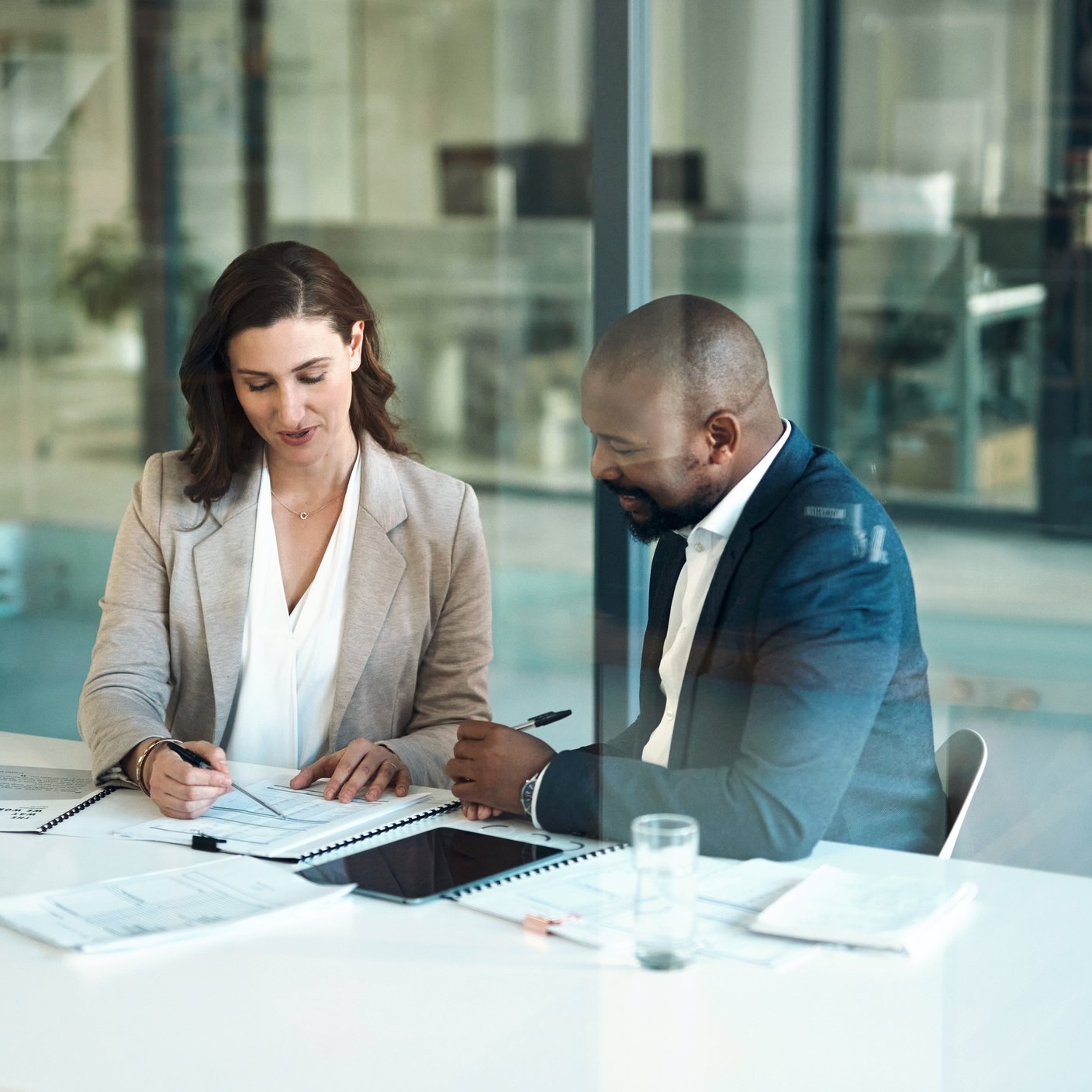 Office, meeting and documents of business people, clients or team for legal matters, taxes, audit or accounting.